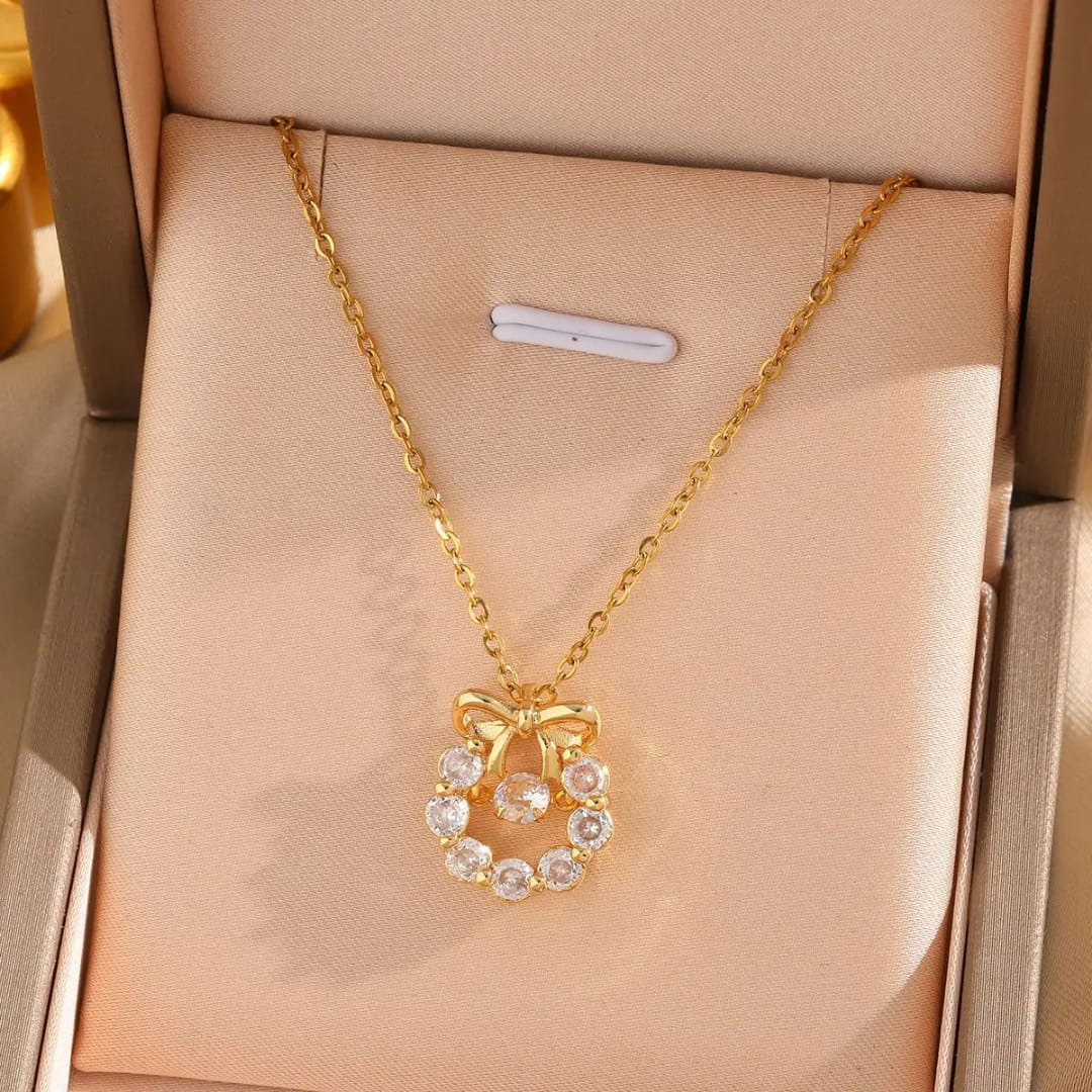 Trinity Charm Bow Pendant Necklace